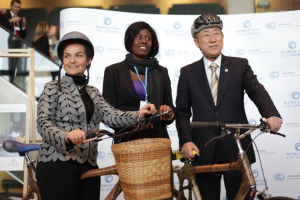 UN Secretary General Ban Ki Moon and UNFCCC Executive Secretary Christiana Figueres with bamboo bike